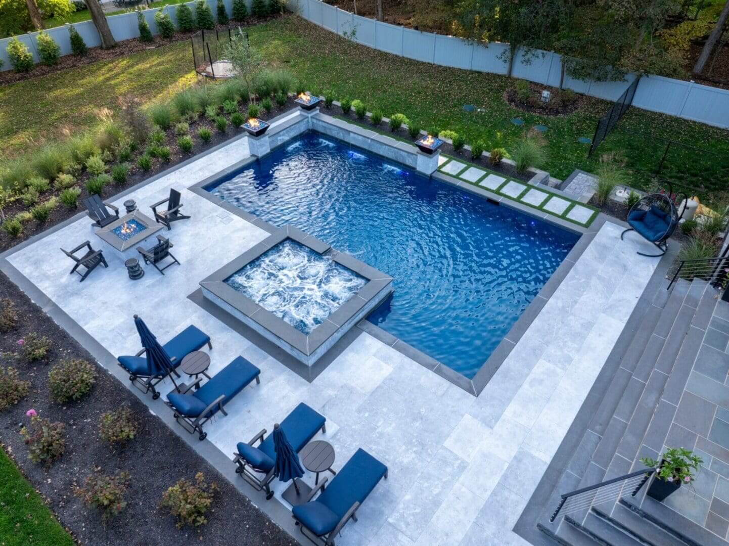 Aerial view of modern backyard pool and spa
